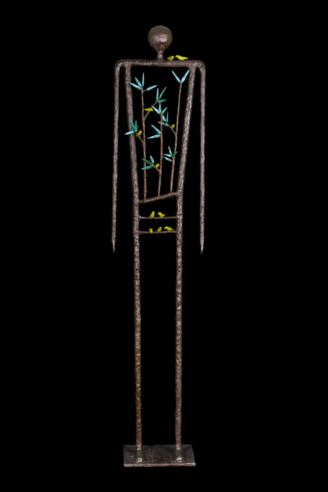 Tall Figure With Yellow Birds